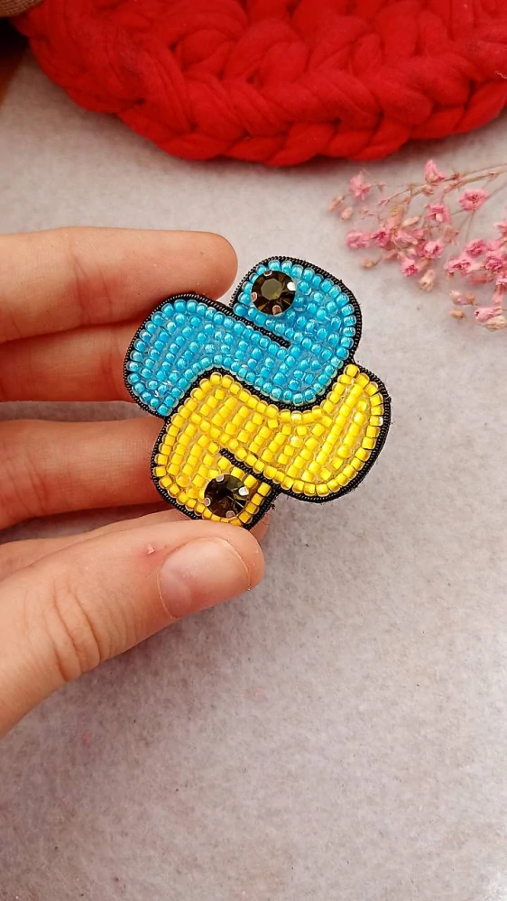 Korálková brož Python